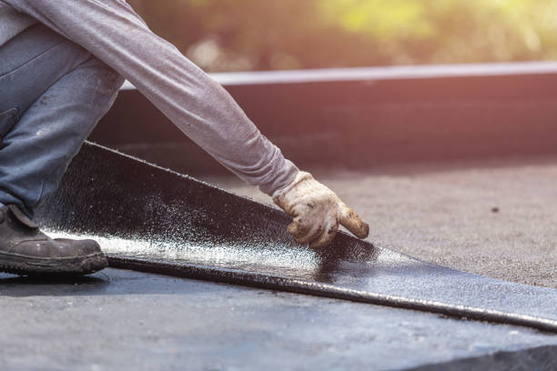 Professional Emergency Waterproofing technician working in Webberville, MI